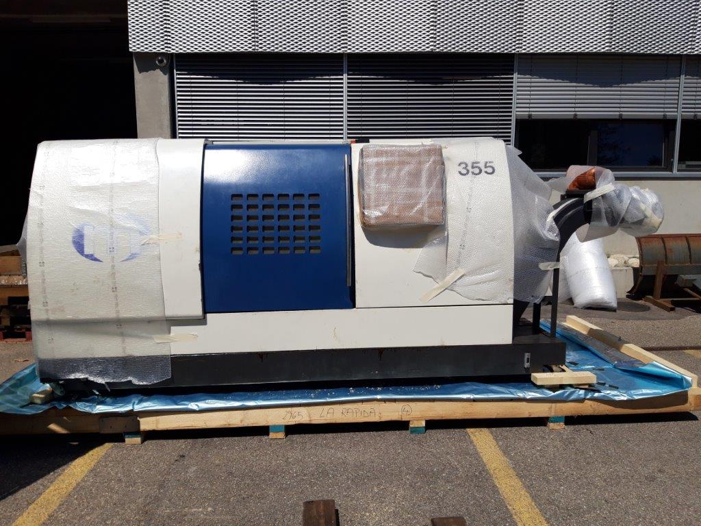 Industrial machine positioned on a base for packing and shipment preparation